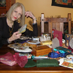 Janax with her tarot cards and tools.
