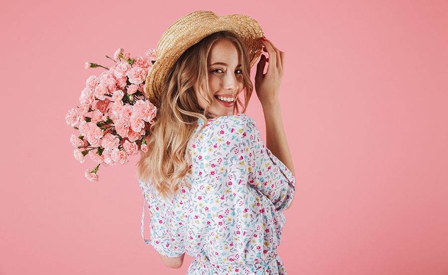 Smiling lady with pink background